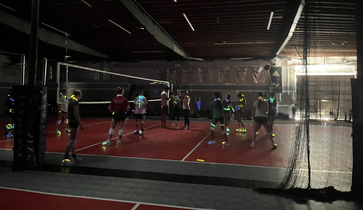 Glow sticks illuminate the Actyve Gym Friday, Oct. 11. To celebrate the end of their season, the JV volleyball team had a glow-in-the-dark themed practice with varsity, inspired by the popular TikTok trend. 